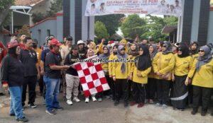 Foto Ketua PGRI Kabupaten Pati Winarto, S.Pd., M.Hum. membuka acara jalan sehat dalam rangka menyambut HGN 2023