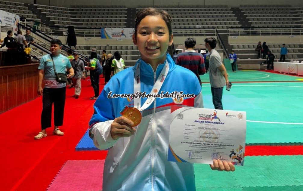 Qiken Dwi Tata, pesilat andalan SH Terate Cabang Pati yang meraih medali emas kelas D remaja putri Kejurnas Remaja 2025